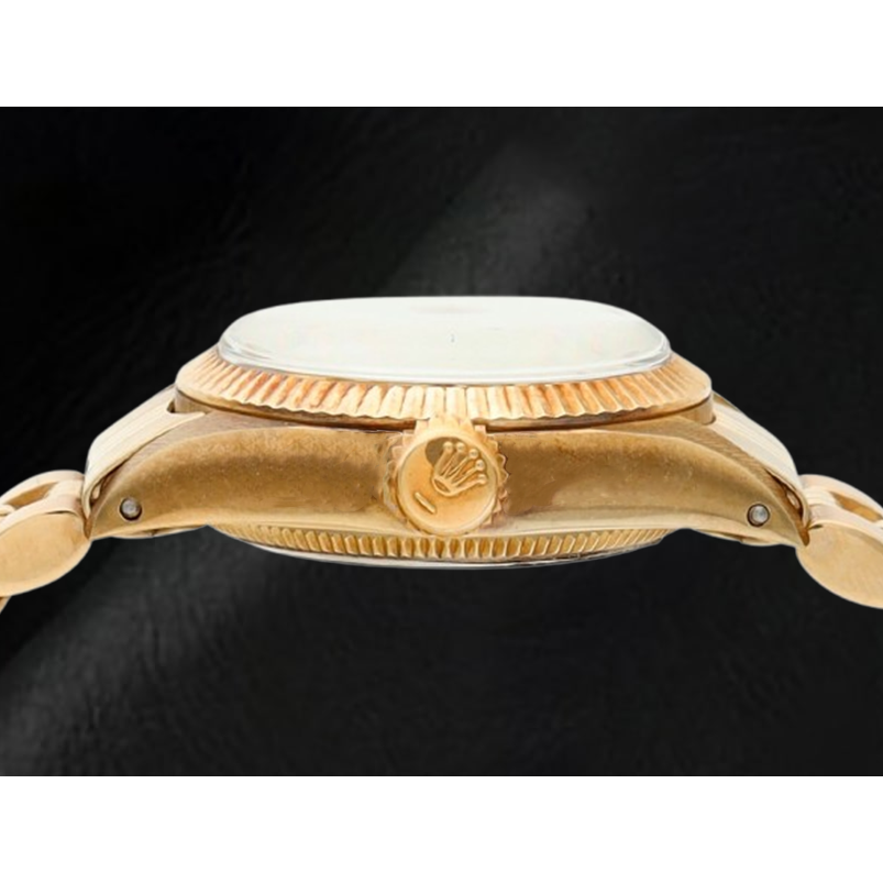 Montre Rolex Oyster Perpetual 24 mm avec cadran champagne et or jaune