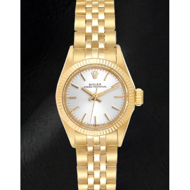 Montre Rolex Oyster Perpetual pour femme avec cadran argenté et or jaune 24 mm