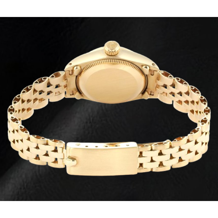 Montre Rolex Oyster Perpetual pour femme avec cadran argenté et or jaune 24 mm