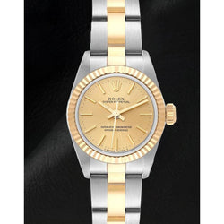Montre Rolex Oyster Perpetual pour femme avec cadran champagne 67193