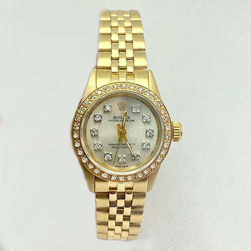 Montre Rolex Oyster avec cadran en nacre et diamants et bracelet Jubilee 