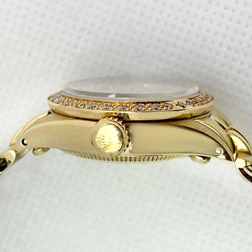 Montre Rolex avec cadran en nacre et diamants et bracelet Jubilee en or jaune
