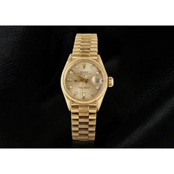 Montre Rolex President avec cadran diamant et lunette cannelée en or jaune pour femme