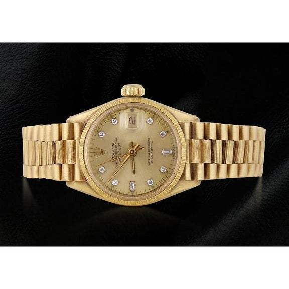 Montre Rolex President avec cadran diamant et lunette 