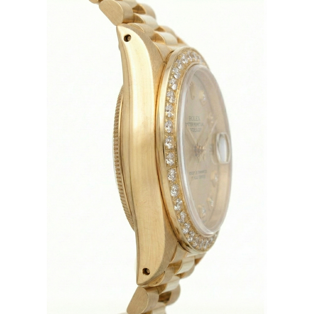 Montre Rolex President en or jaune, cadran champagne serti de diamants et lunette sertie de diamants 