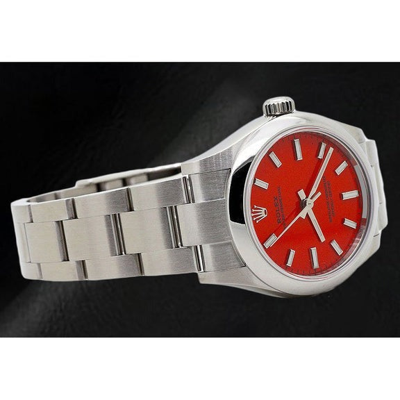 Montre Rolex 31 mm en acier à cadran lumineux rouge corail
