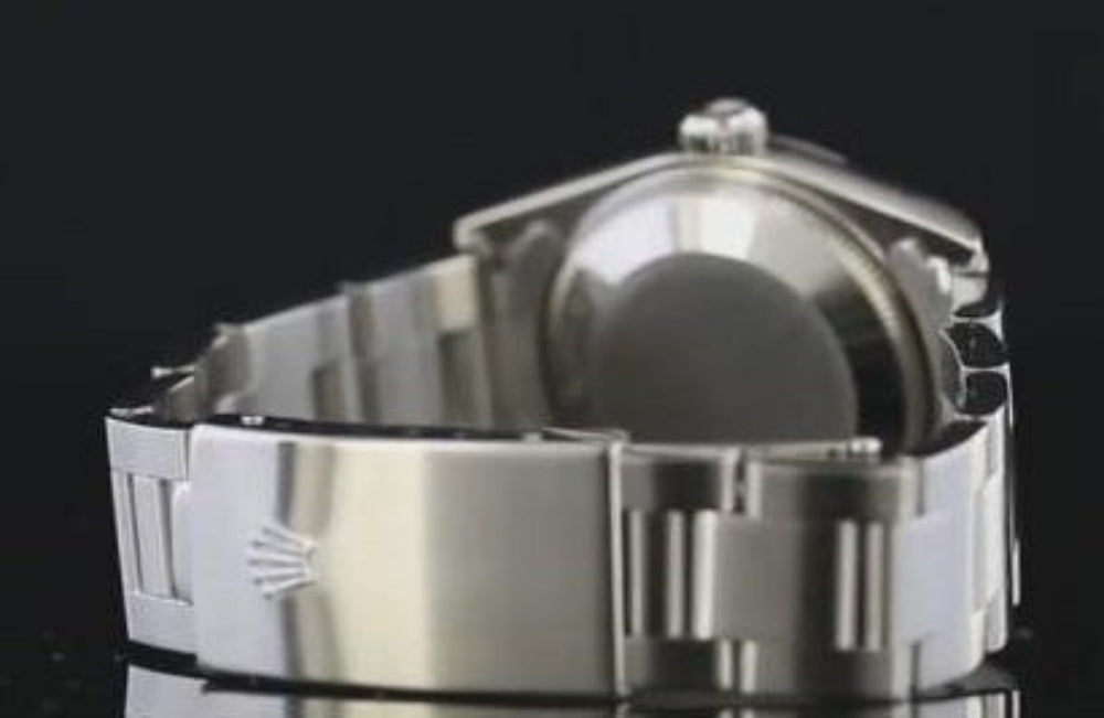 Montre Rolex de taille moyenne 31 mm, lunette lisse, cadran
