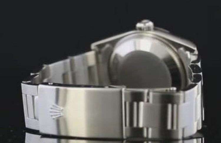 Montre Rolex de taille moyenne 31 mm, lunette lisse, cadran