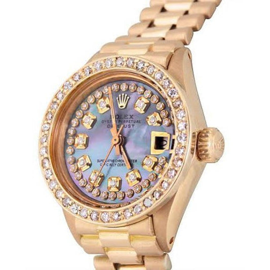 Montre Rolex en or jaune pour femme 
