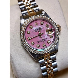 Montre Rolex pour femme en or jaune 18 carats avec cadran rose serti de diamants