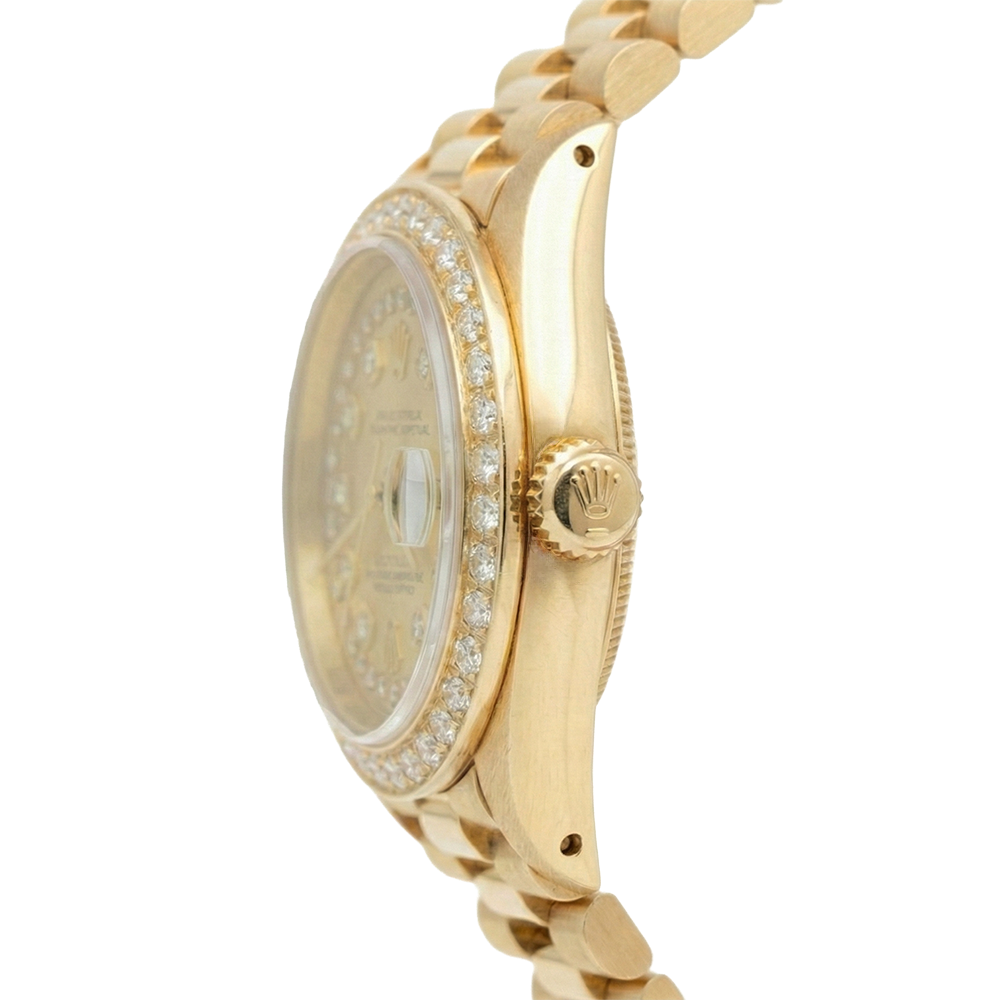 Montre à cadran à cordes champagne de still président Rolex avec lunette en diamant or jaune