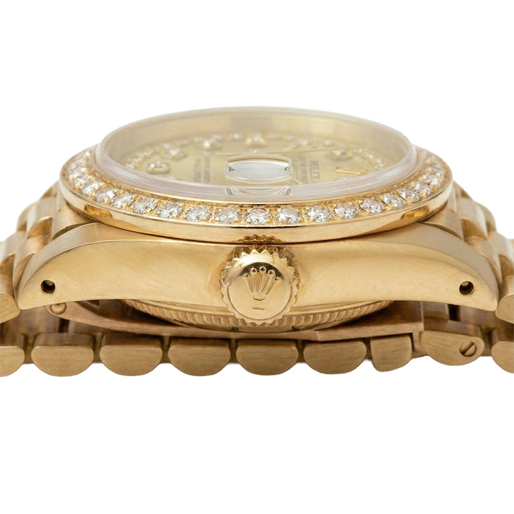 Montre à cadran à cordes champagne de still président Rolex avec lunette en diamant or jaune