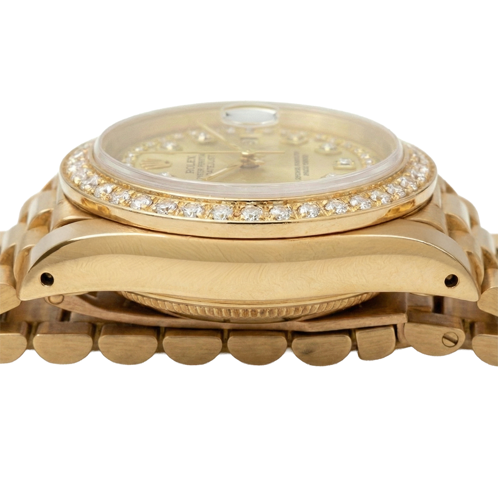 Montre à cadran à cordes champagne de still président Rolex avec lunette en diamant or jaune