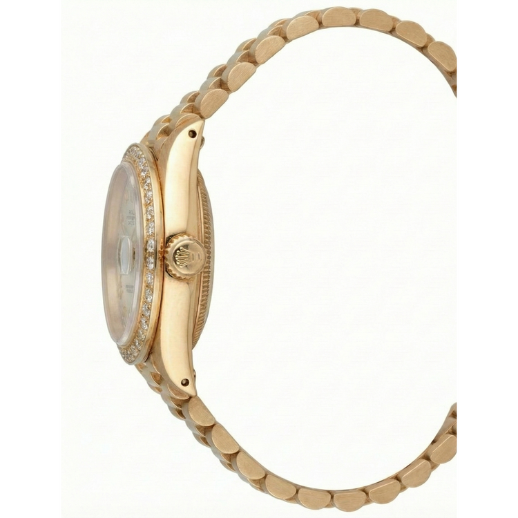 Montre de still président datejust Rolex en or, cadran romain blanc, lunette en diamant