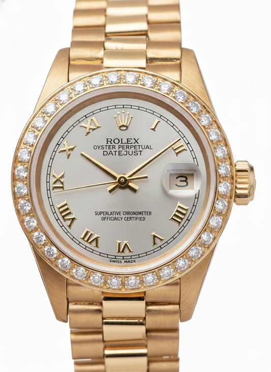 Montre de still président datejust Rolex en or, cadran romain blanc, lunette en diamant