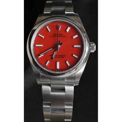 Montre en acier à cadran lumineux rouge corail Rolex huître Perpétuelle