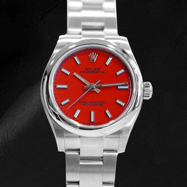Montre en acier à cadran lumineux rouge corail Rolex huître Perpétuelle