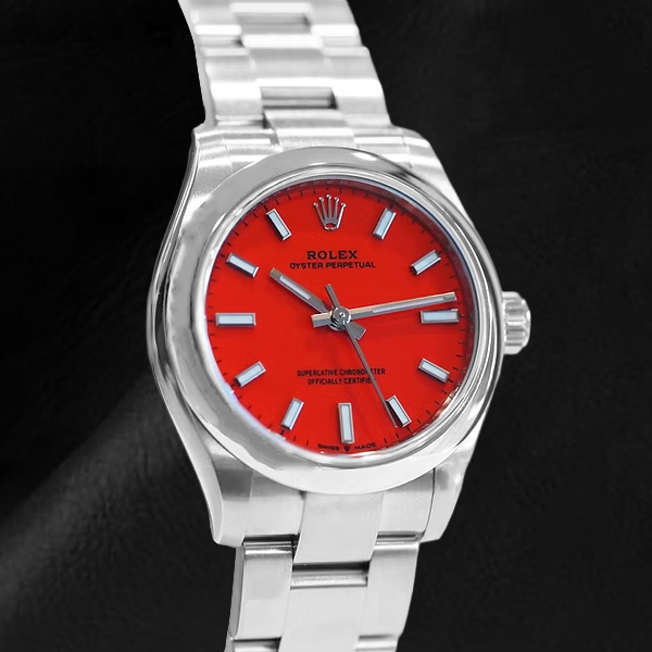 Montre en acier à cadran lumineux rouge corail Rolex huître Perpétuelle