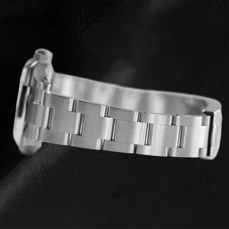 Montre en acier à cadran lumineux rouge corail Rolex huître Perpétuelle