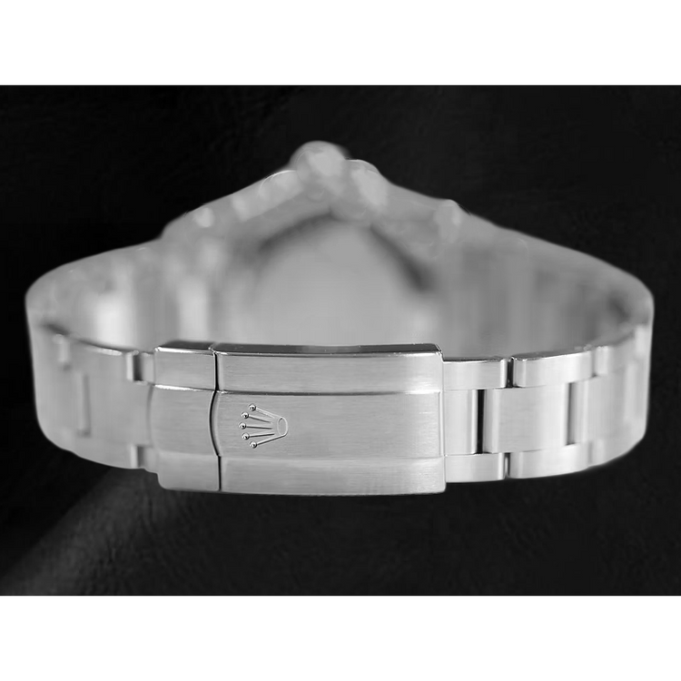 Montre en acier à cadran lumineux rouge corail Rolex huître Perpétuelle