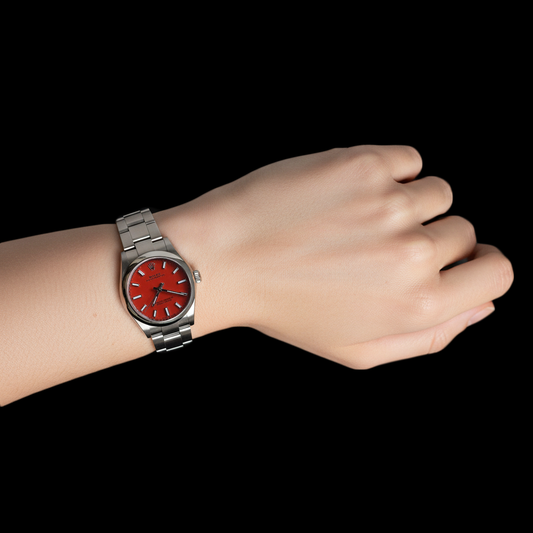 Montre en acier à cadran lumineux rouge corail Rolex huître Perpétuelle P3