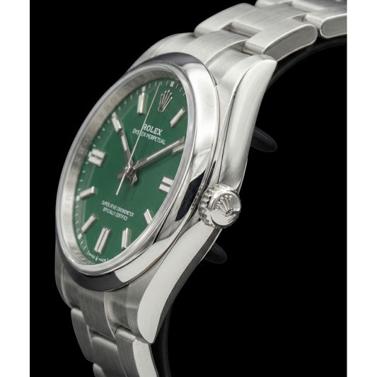 Montre en acier à cadran lumineux vert Rolex huître Perpétuelle pour femme