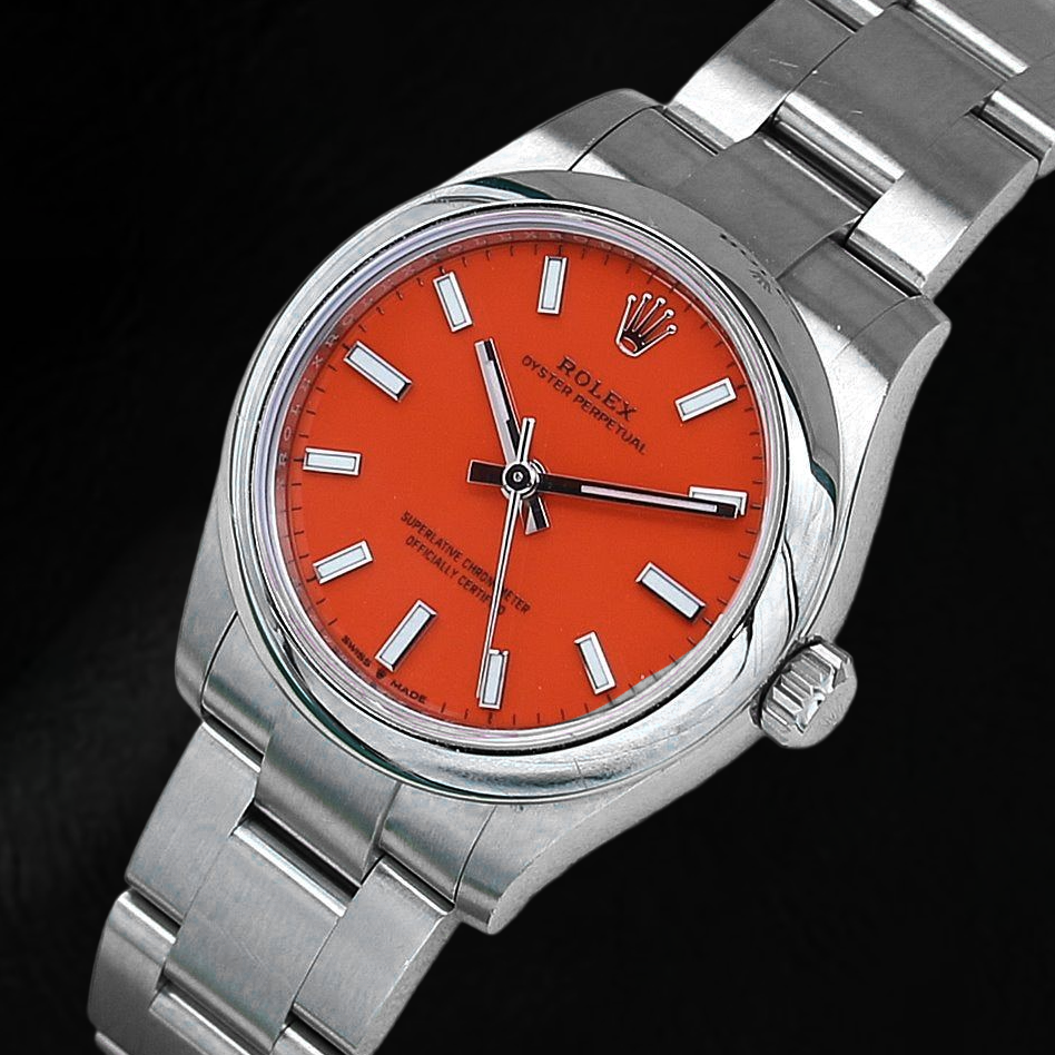 Montre pour homme en acier à cadran lumineux rouge corail Rolex Oyster Perpetual 31 mm