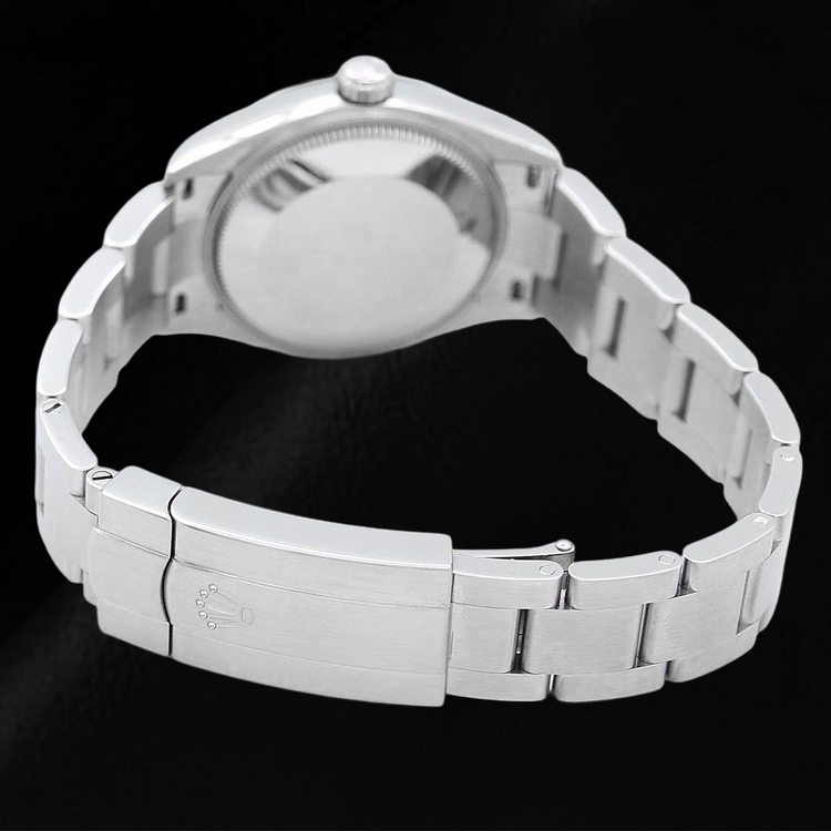 Montre pour homme en acier à cadran lumineux rouge corail Rolex Oyster Perpetual 31 mm