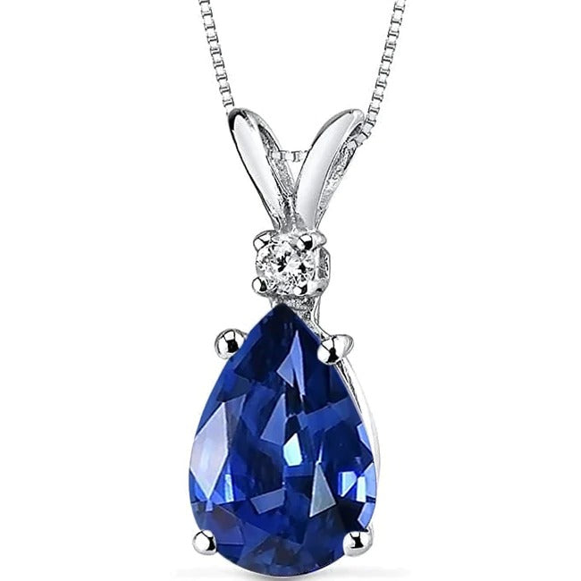 Pendentif Diamant Rond & Saphir Bleu Poire Serti 4 Griffes 4 Carats