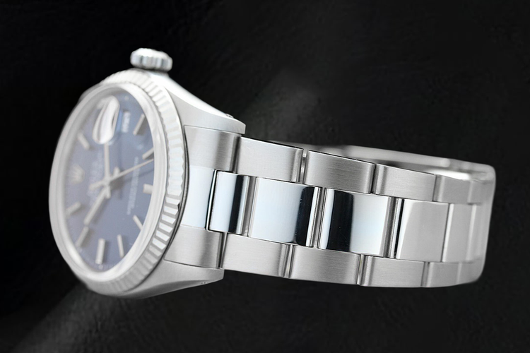 Montre Rolex Datejust 36 mm Lunette Cannelée Acier Inoxydable Cadran Bleu à Index Bâtons
