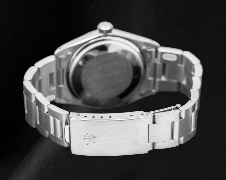 Montre Rolex Datejust 36 mm en Acier Inoxydable, Lunette Cannelée, Cadran Bleu à Index Bâtons