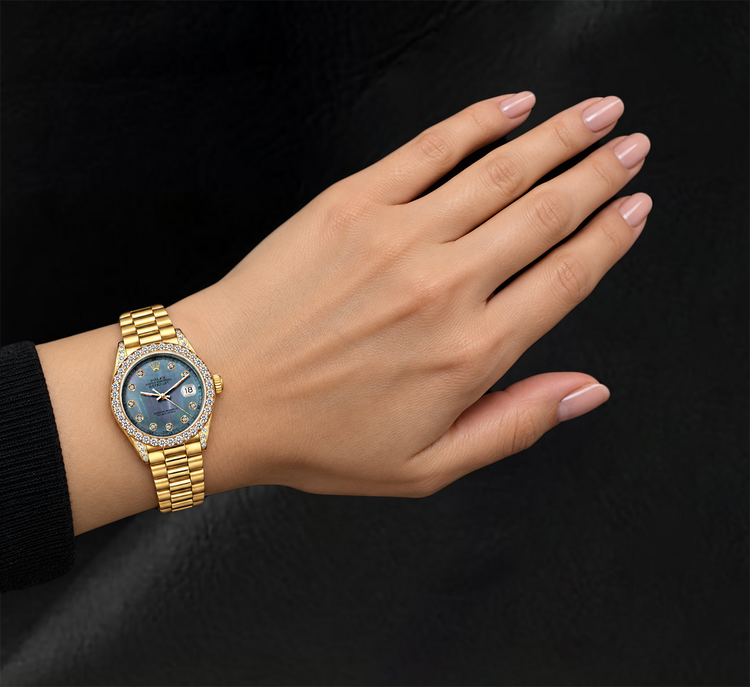 Montre Rolex Datejust 26 mm 69178 en Or Jaune Cadran Diamants Nacre Bleue