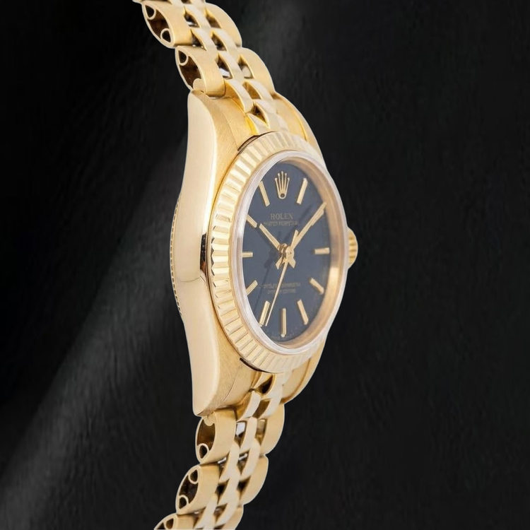 Rolex 67197 Oyster Perpetual Cadran Noir à Index Bâtons 24mm Or Jaune Montre Femme