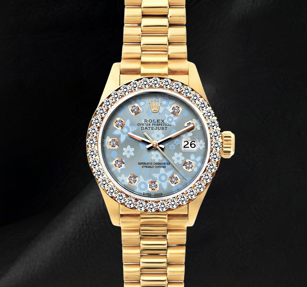Montre Rolex 69178 Datejust 26 mm Cadran Diamants Floral Bleu Glacier Bracelet President en Or 18 Carats