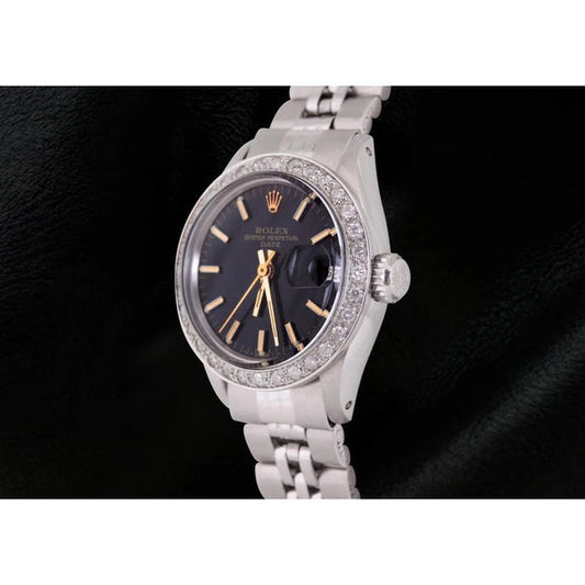 Rolex Date cadran bâton noir lunette diamant montre