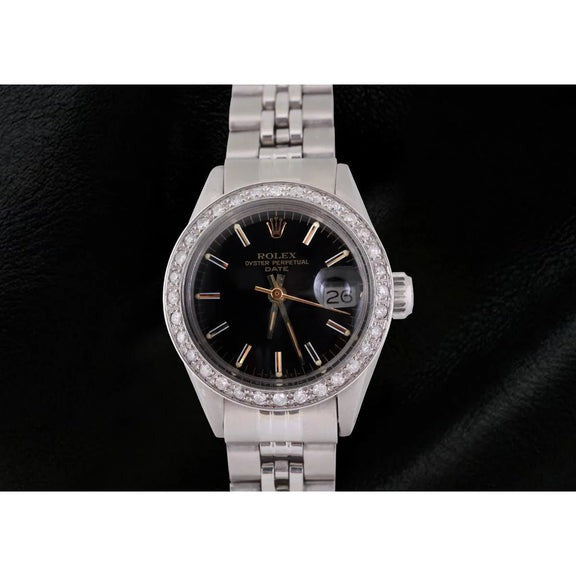Rolex Date cadran bâton noir lunette diamant montre femme 