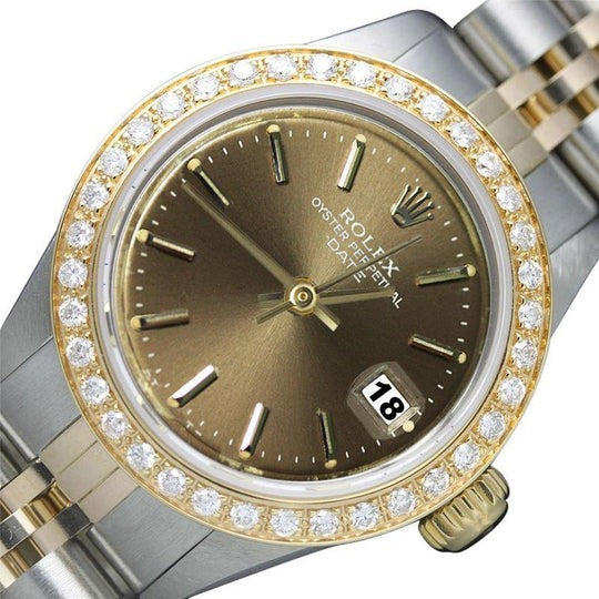 Rolex Date champagne bâton cadran diamant lunette 