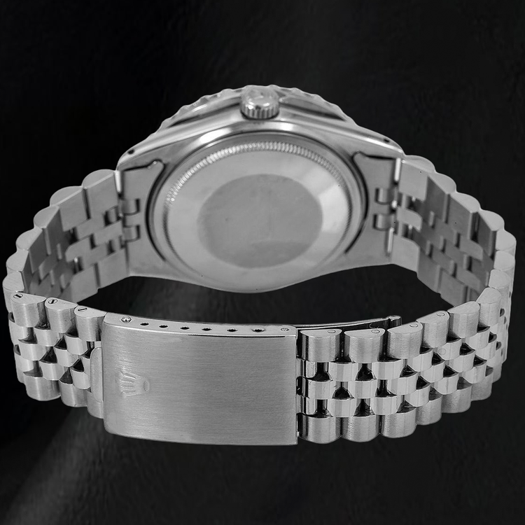 Montre Rolex Datejust 16014 36 mm en Acier Inoxydable Cadran Diamants Noir Chiffres Romains