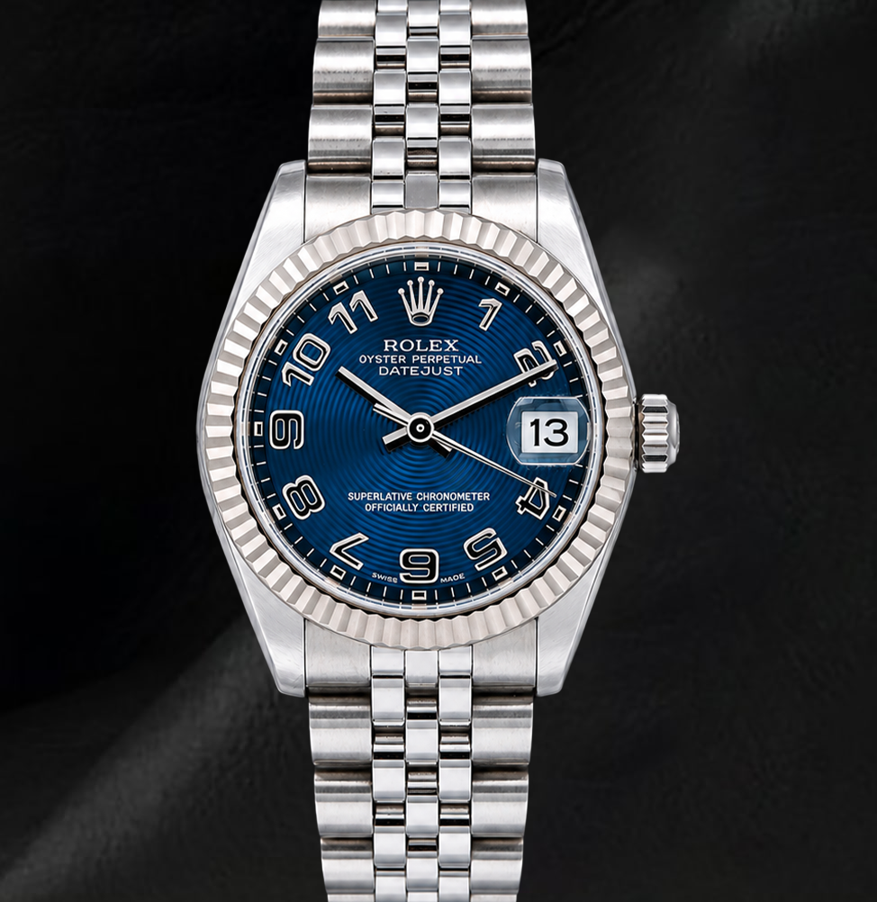 Montre Rolex Datejust 31 mm 178274 Cadran Bleu à Chiffres Arabes Lunette Cannelée en Or Blanc