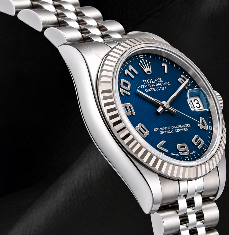 Montre Rolex Datejust 31 mm 178274 Cadran Bleu à Chiffres Arabes Lunette Cannelée en Or Blanc