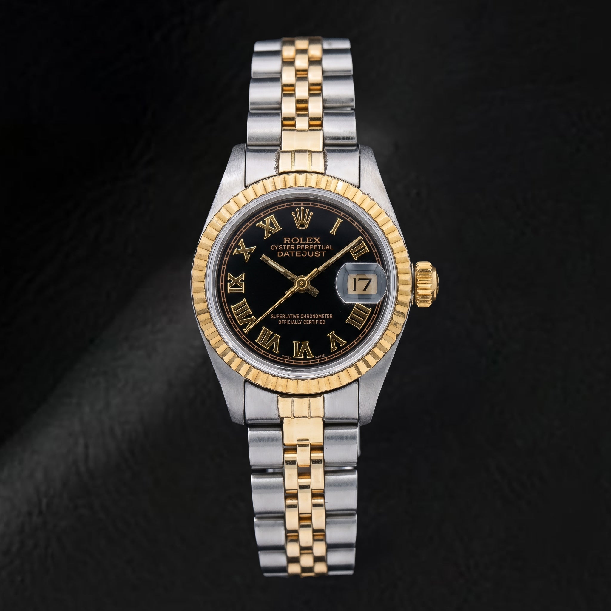 Montre Rolex Datejust 69173 26 mm bicolore cadran noir chiffres romains