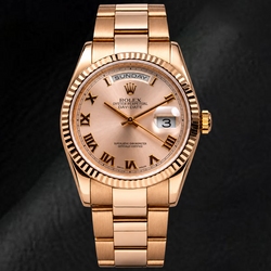 Rolex Day-Date 118235 36 mm Cadran Sundust à Chiffres Romains Or Rose 18 carats Bracelet Oyster