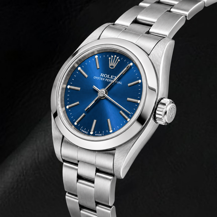 Montre Rolex Oyster Perpetual 76080 26 mm en Acier Inoxydable Cadran Bleu à Index Bâtons