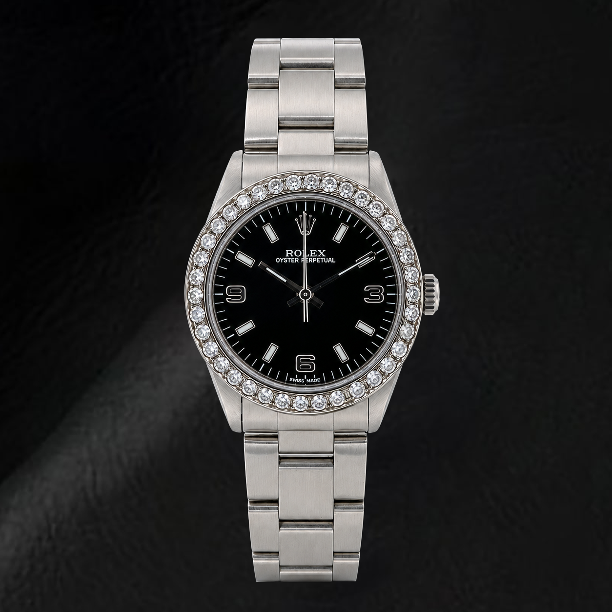 Montre Rolex Oyster Perpetual 77080 31 mm Cadran Noir à Chiffres Arabes en Acier Inoxydable