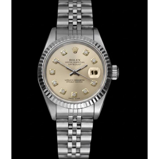 Rolex dame Datejust montre argent acier inoxydable jubilé bracelet lunette cannelée