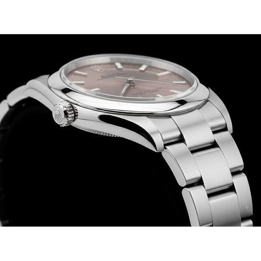 Rolex huître Perpétuelle 31 mm cadran lumineux saumon montre en acier pour femme
