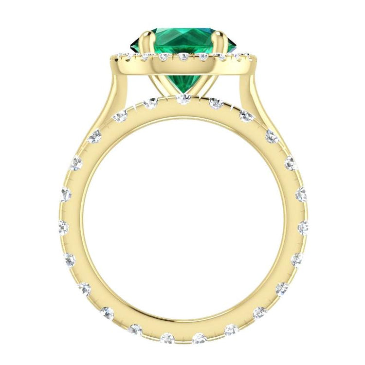 Runder Ring aus Gelbgold und grünem Smaragd