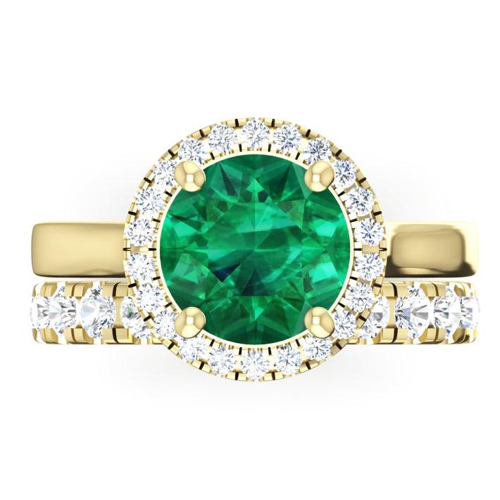 Runder Ring aus Gelbgold und grünem Smaragd