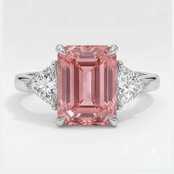 Bague trois pierres en platine, saphir Padparadscha 3,6 carats, émeraude véritable et trilliant blanc