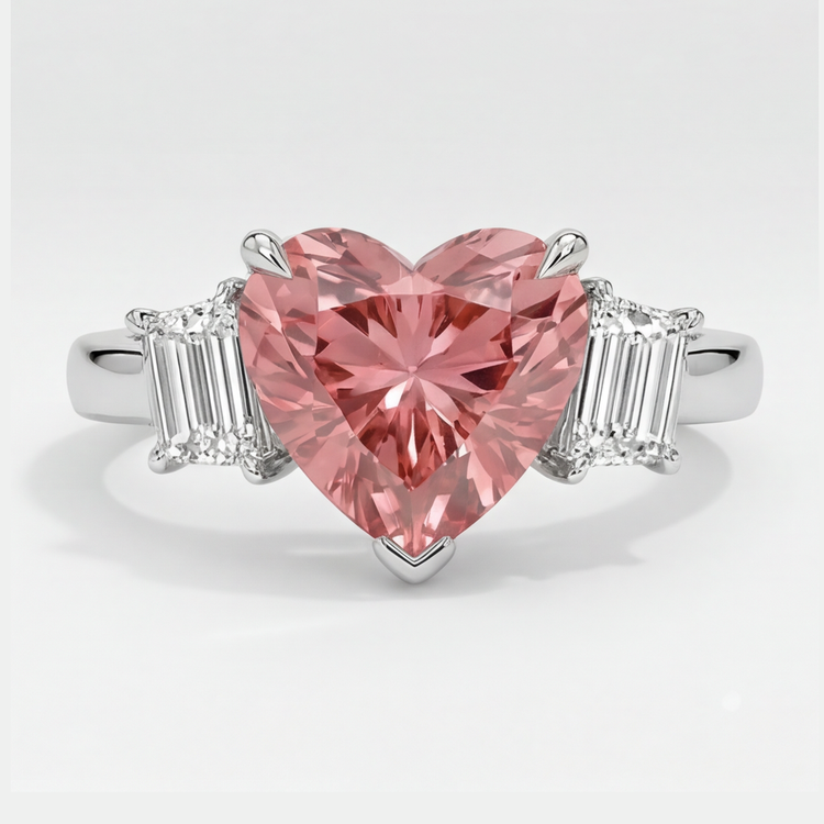 Bague trois pierres en platine avec saphir padparadscha naturel taille cœur de 3,6 carats et baguettes blanches